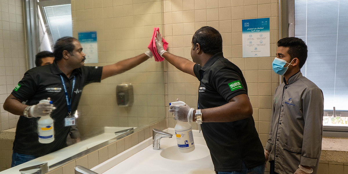 Cleaning professional applying BICSc standards during training in Saudi Arabia