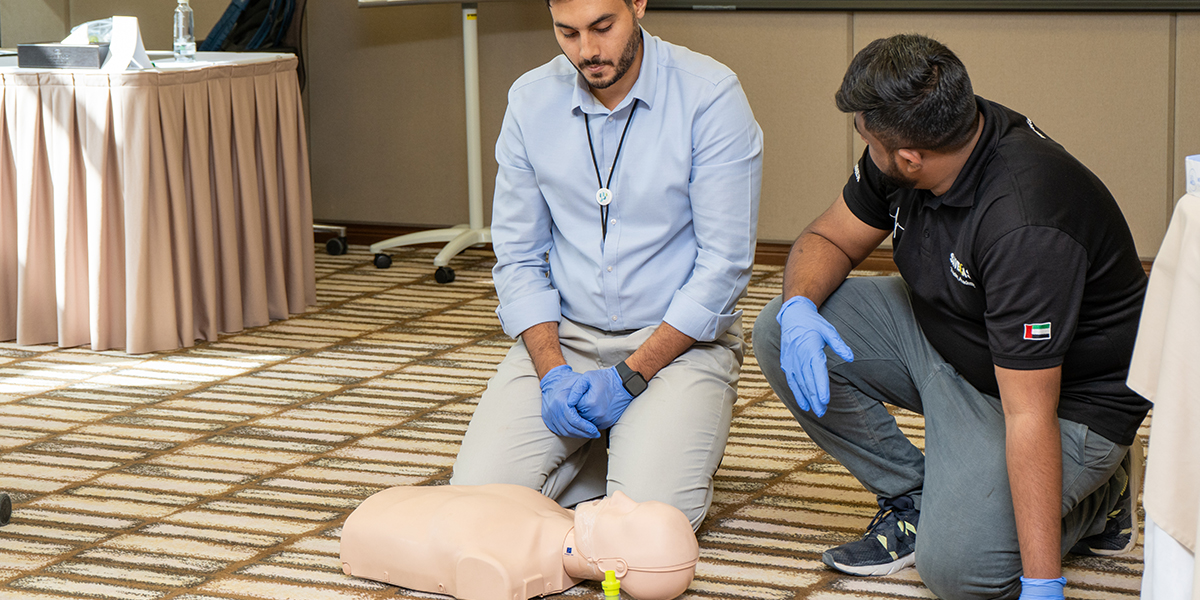 Employee practicing CPR during First Aid Training in Riyadh
